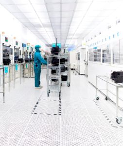 X FAB France cleanroom with operator